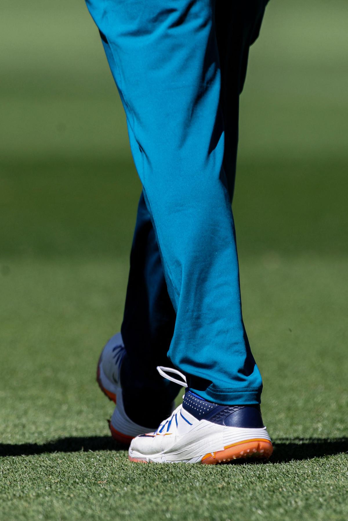 Australia’s Usman Khawaja is seen on the field with a tape strapped on his left shoe to hide a message of support for people in Gaza, having been told it is against ICC rules, before the first day of the first Test cricket match between Australia and Pakistan at Optus Stadium in Perth on December 14, 2023. 