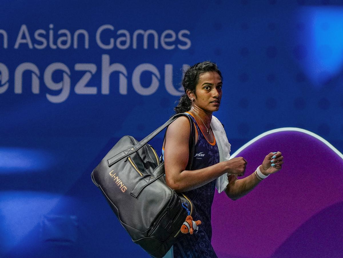 India’s P.V. Sindhu leaves after losing the Women’s Singles quarterfinal badminton match against and China’s He Bingjiao at the 19th Asian Games, in Hangzhou on October 5, 2023. 