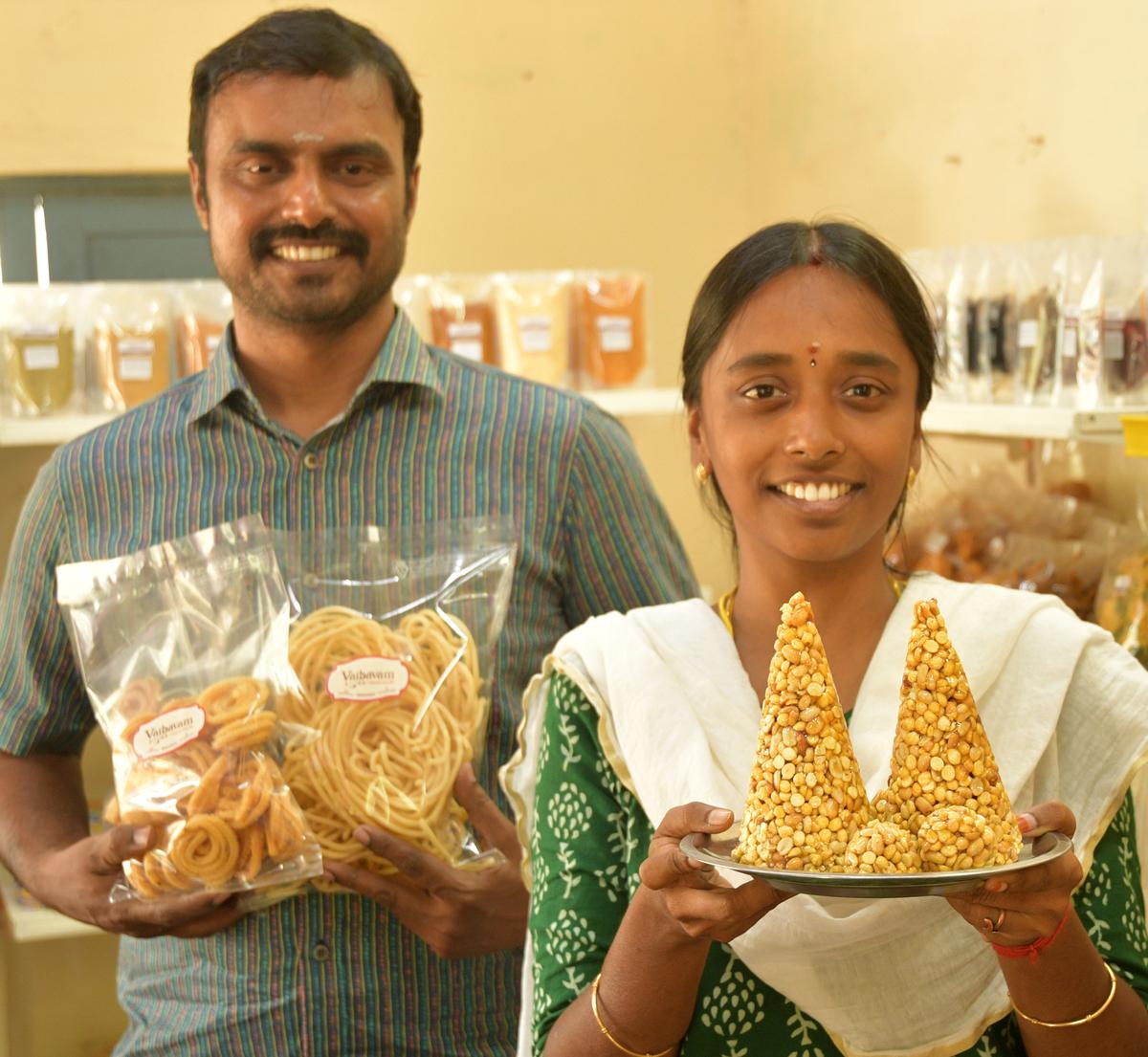 Vaibavam Foods founders S Senthil and Janani with some of the brand’s traditional snacks.