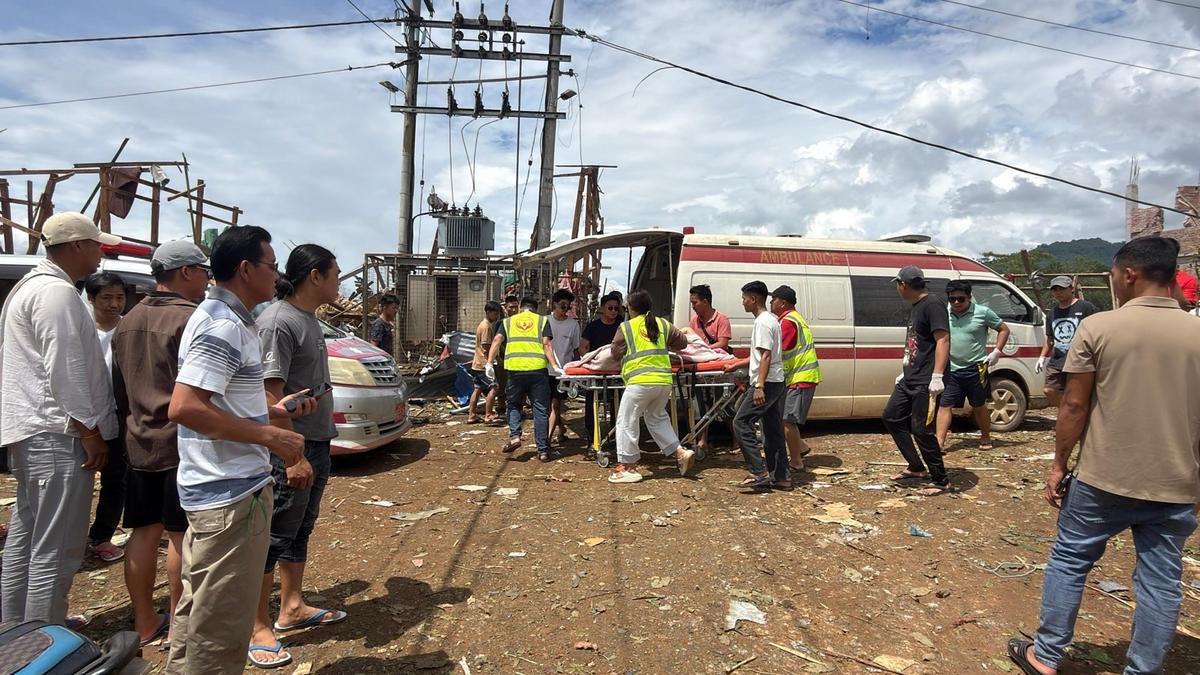 Rescuers dig for bodies after a massive mining explosives blast in Myanmar kills at least 38