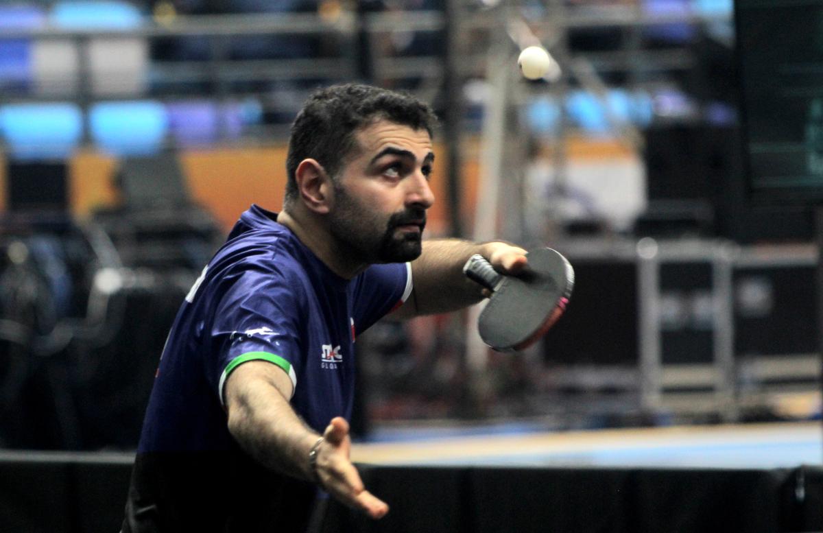 Iran’s Noshad Alamiyan in action against Maldives in the 28th Asian table tennis team championship at the Kalinga Stadium in Bhubaneswar, on Saturday, October 11, 2025.