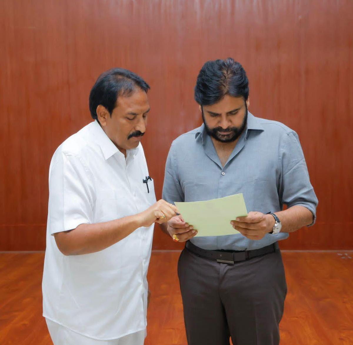 ANDHRA PRADESH, KAKINADA, 24-10-2025: Kothapeta MLA Bandaru Satyananda Rao interacting with Mr. Pawan Kalyan about Vadapalli temple road in Mangalagiri on Thursday. BY ARRANGEMENT