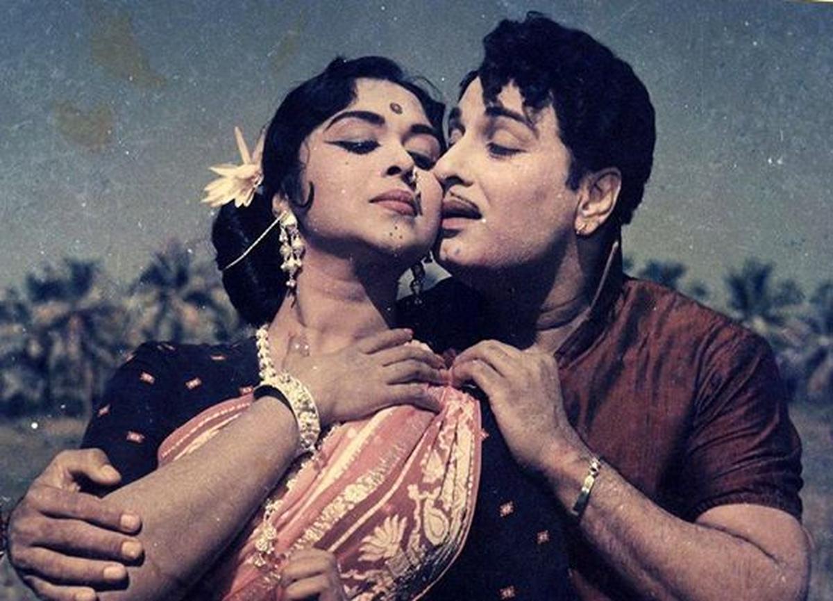 Saroja Devi and M.G. Ramachandran in the Tamil film Padagotti Saroja Devi and M.G. Ramachandran in the Tamil film Padagotti