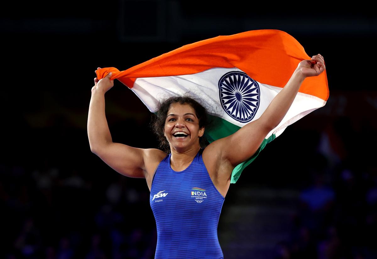 Sakshi Malik celebrates her win at the Birmingham 2022 Commonwealth Games, in England. 