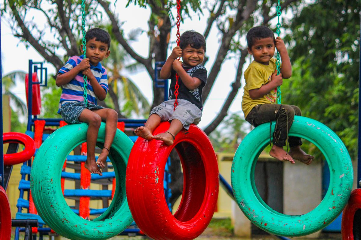 Children playing at a playground created with discarded tyres under Project Play, the brainchild of young IAS officer Dhatri Reddy, who is the Assistant Collector (UT) of Anakapalli district.