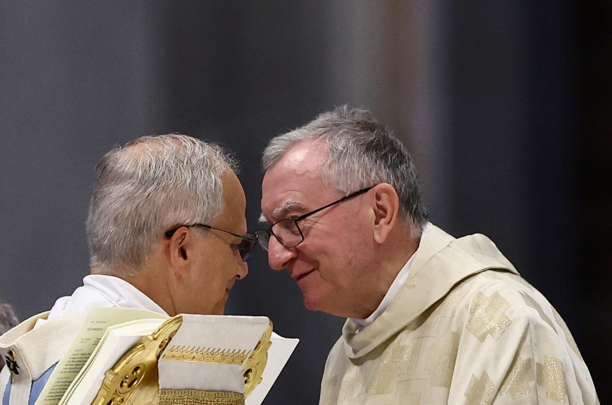 Pope Leo XIV speaks with Vatican Secretary of State Cardinal Pietro Parolin