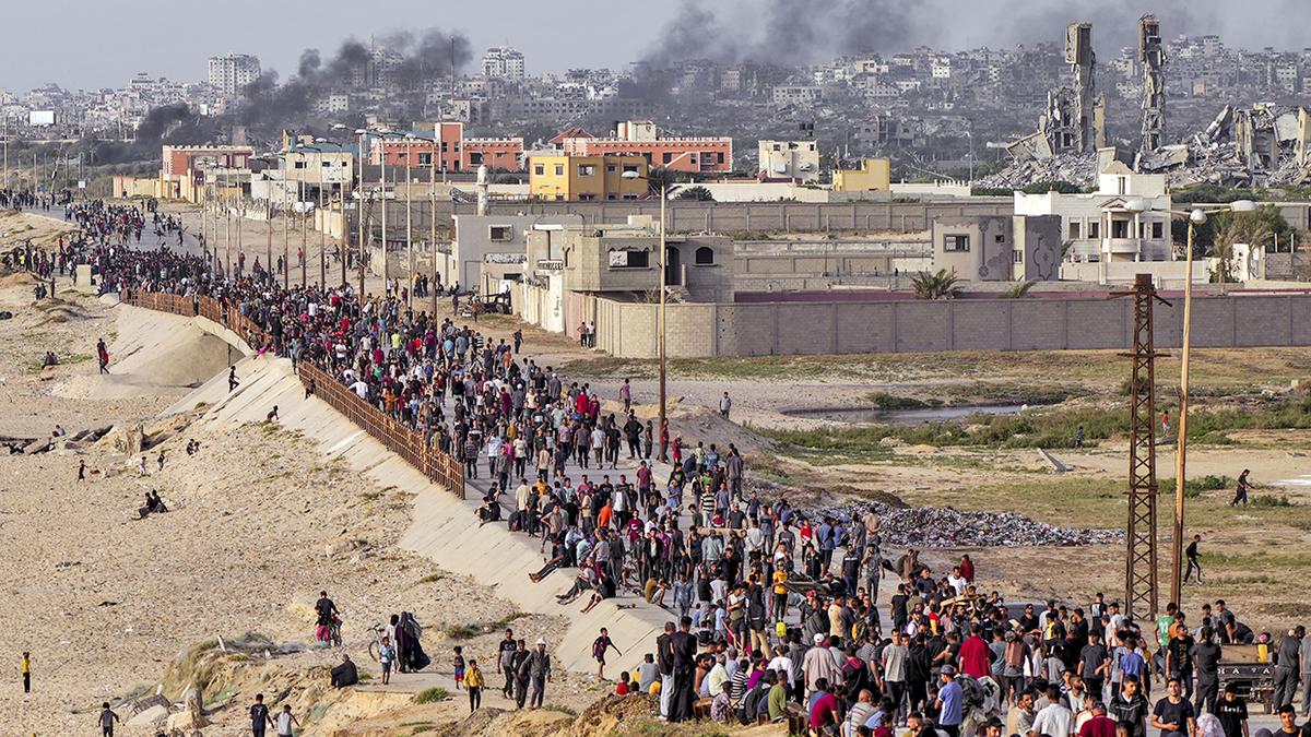 Aid trucks begin entering Gaza under agreement with Egypt to bypass Rafah