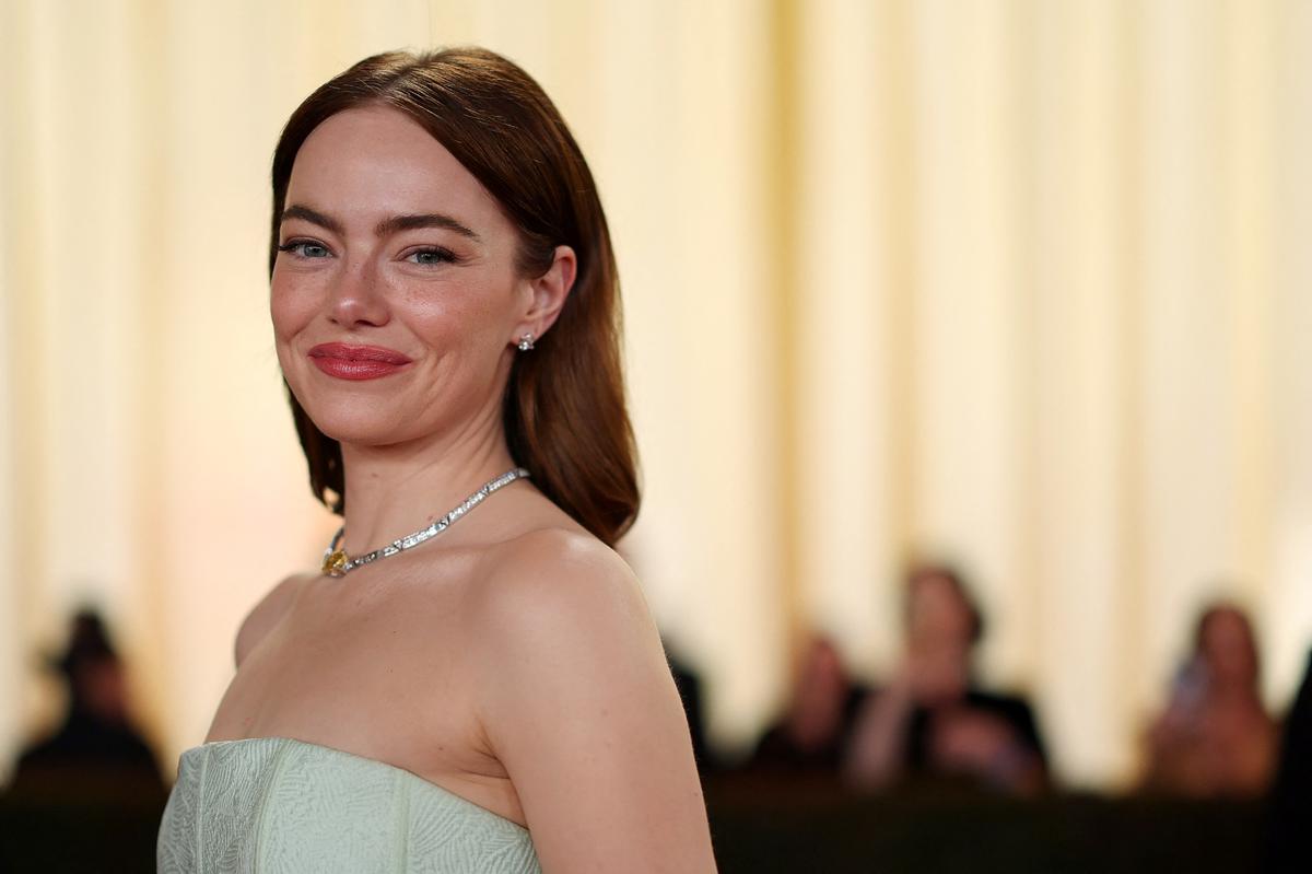 Emma Stone poses on the red carpet during the Oscars arrivals at the 96th Academy Awards in Hollywood, Los Angeles, California, U.S., March 10, 2024. REUTERS/Mario Anzuoni
