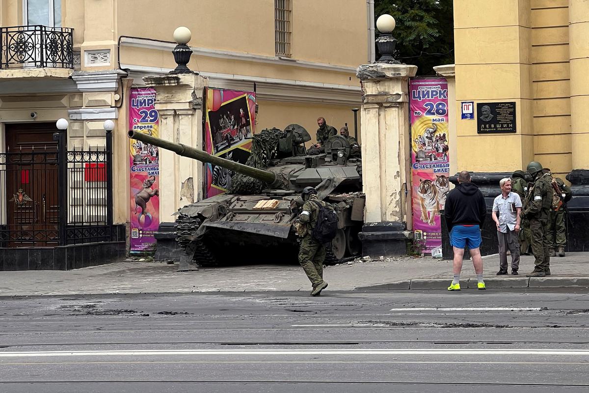 Fighters of Wagner private mercenary group are seen atop of a tank in a street near the headquarters of the Southern Military District in the city of Rostov-on-Don, Russia, on June 24, 2023. 