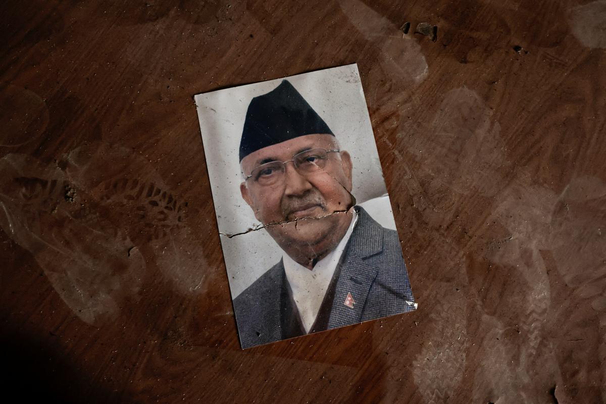 A picture of former Nepali Prime Minister, K.P. Sharma Oli, lies on the floor in the Singha Durbar office complex.