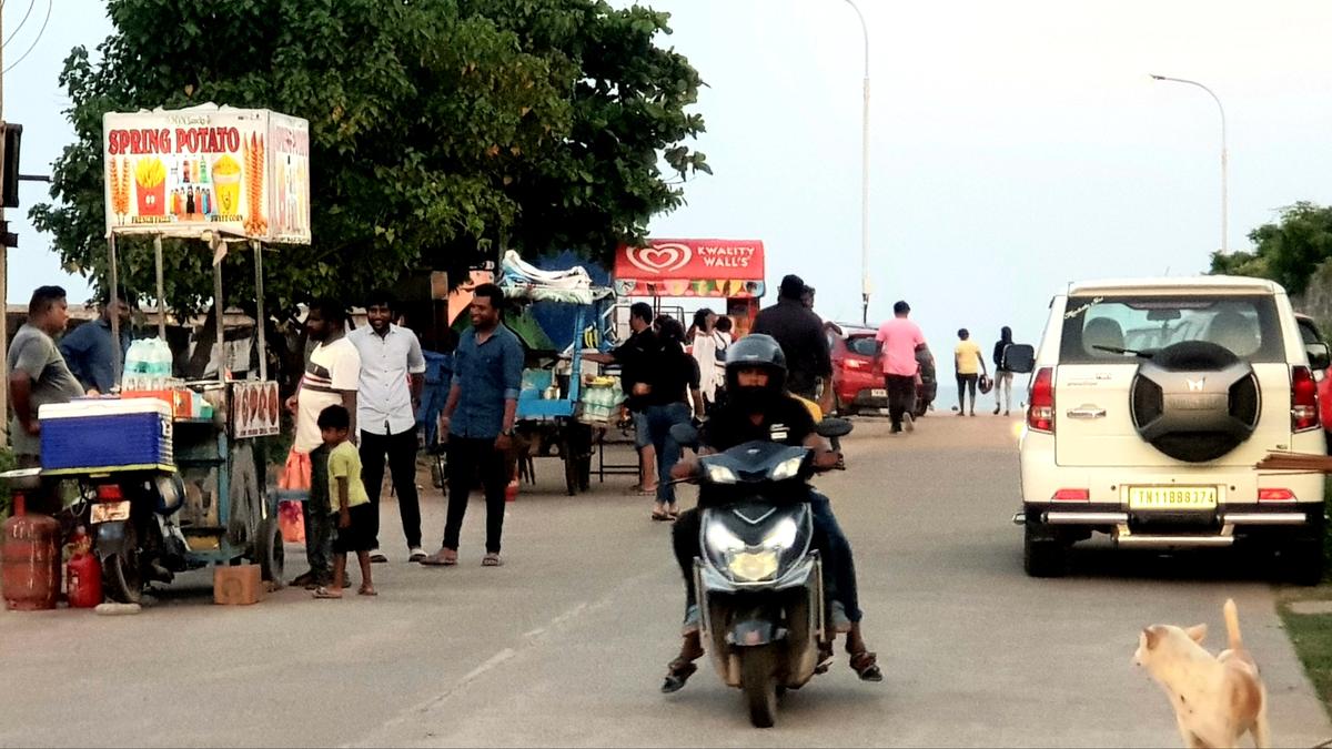 Haphazard parking of vehicles chokes traffic on this road at Uthandi