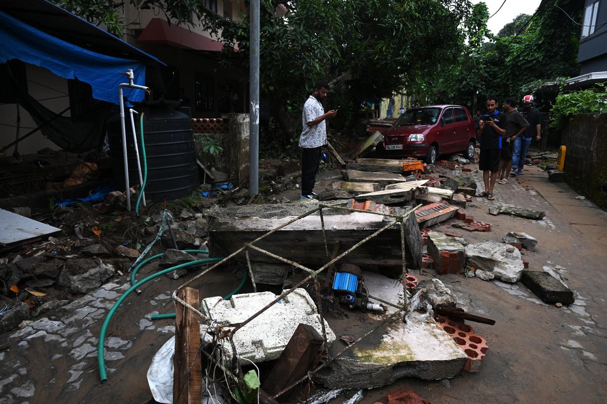 A house at Thammanam in Kochi severely damaged after the collapse of the water tank.