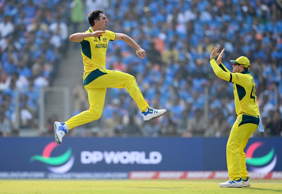 Cummins celebrates the wicket of Shreyas Iyer during the ICC Cricket World Cup India 2023 final against India