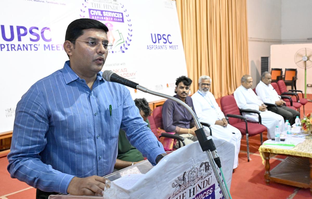 District Collector K.J. Praveen Kumar speaking at the UPSC Aspirants Club inauguration at Arul Anandar College, organised by The Hindu, in Madurai on Thursday. 