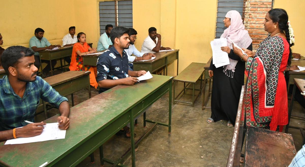 Candidates for village assistant posts stage road roko in Erode