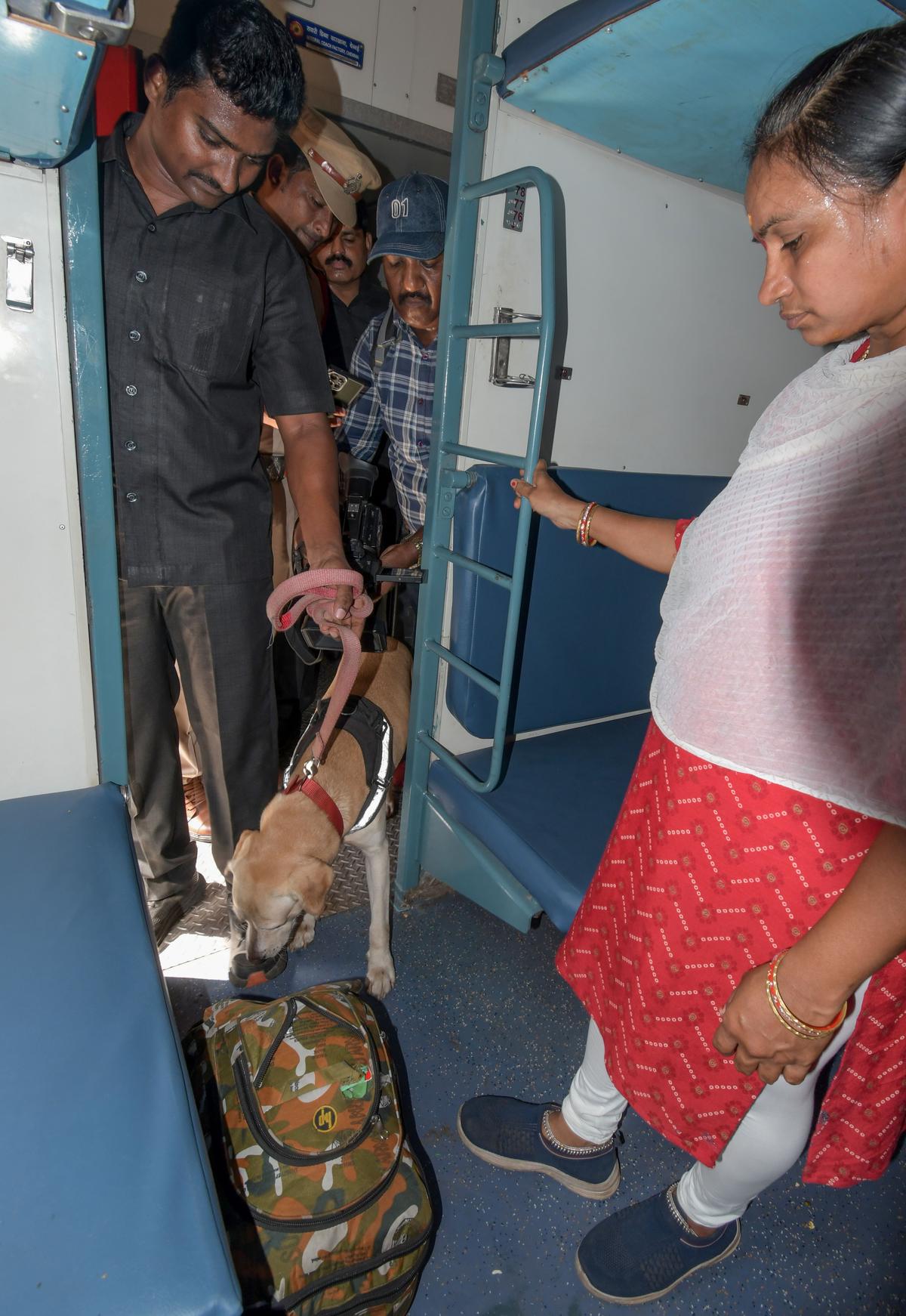 Dog squad checking the compartments on LTT Express at Visakhapatnam Railway Station on Saturday. 