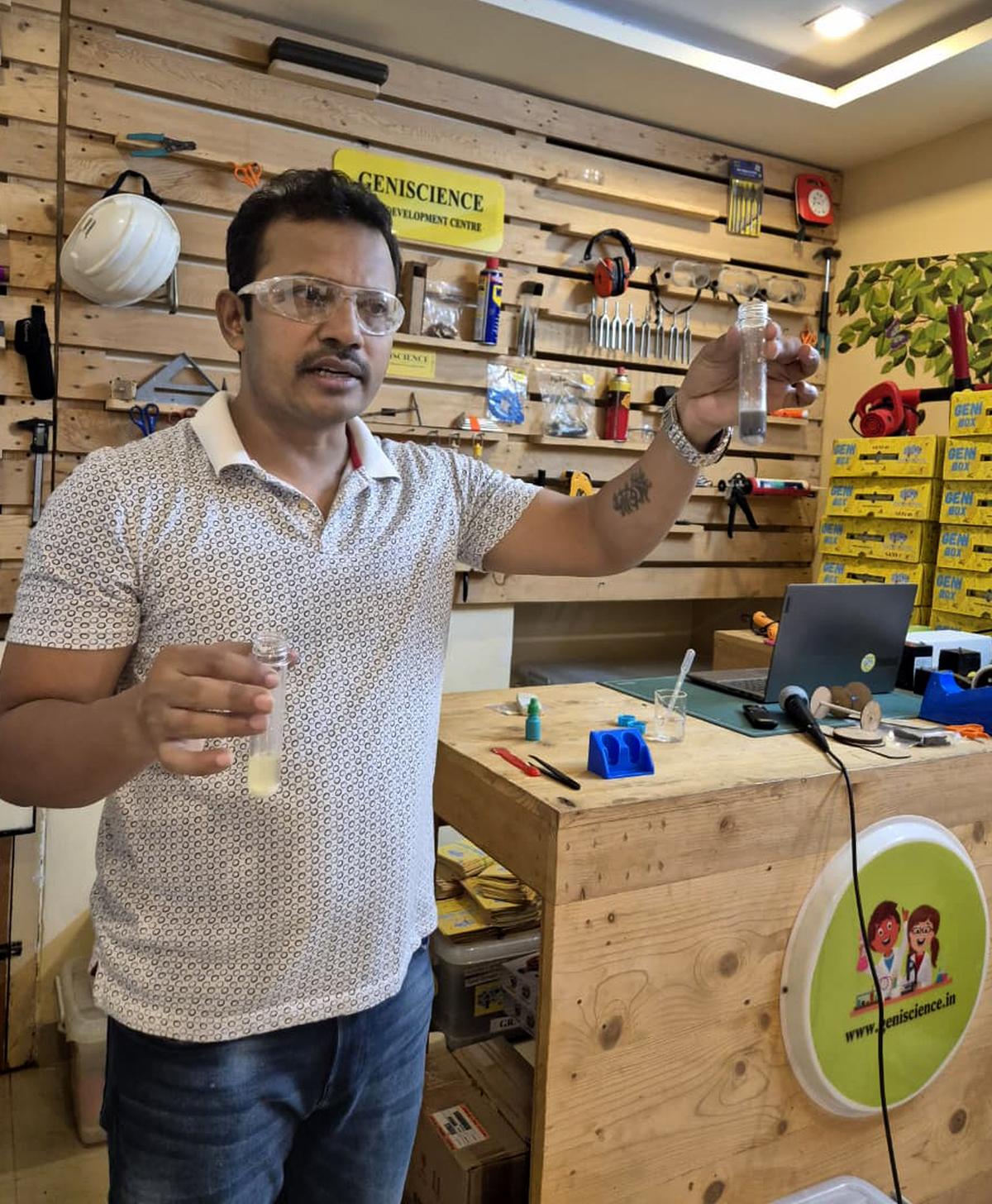 Pramod Kumar Reddy, founder of Geniscience, demonstrating a science experiment. 