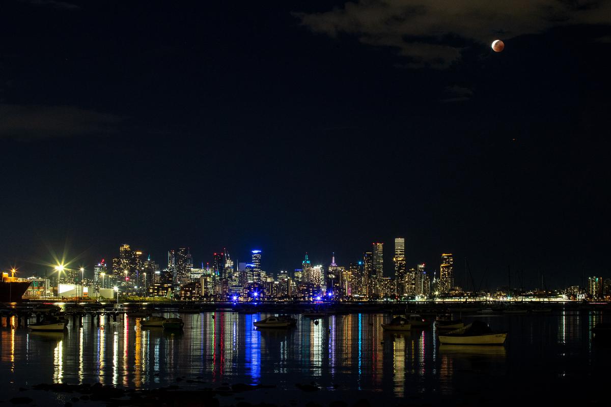 The 'Blood Moon' or lunar eclipse is seen from Williamstown in Melbourne on November 08, 2022 in Melbourne, Australia. 