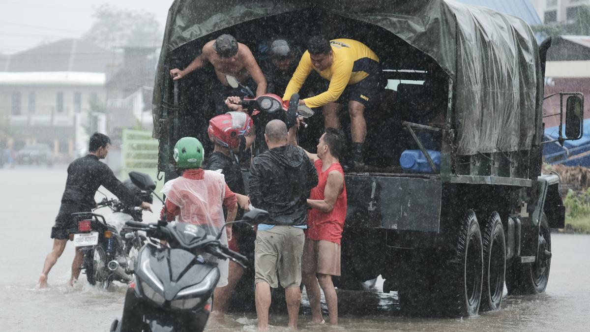 Tropical storm battering Philippines leaves 23 people dead in flooding, landslips