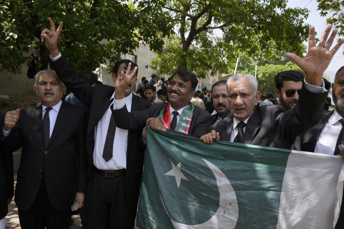Lawyers and supporters of Pakistani imprisoned former Prime Minister Imran Khan react after court decision, in Islamabad, Pakistan on August 29, 2023.