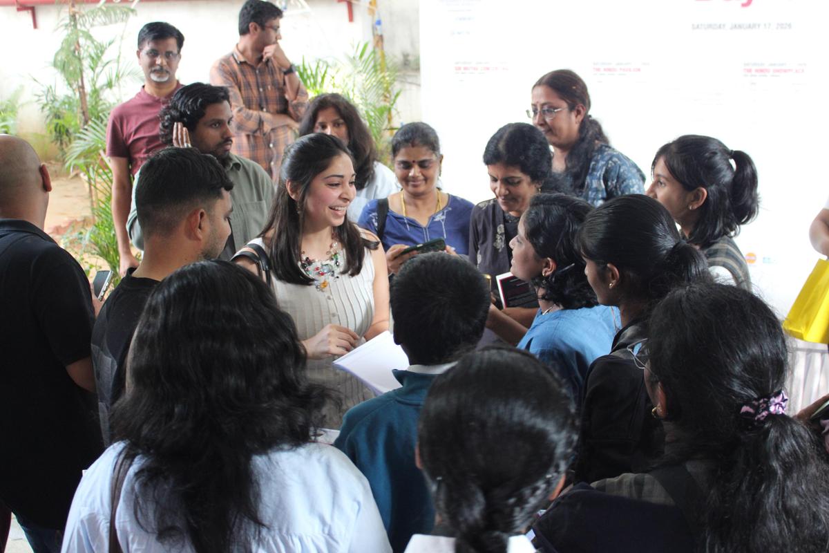 Author Manasi Chaudhari signs copies of her books for participants at The Hindu Lit for Life 2026 in Chennai on January 17, 2026.