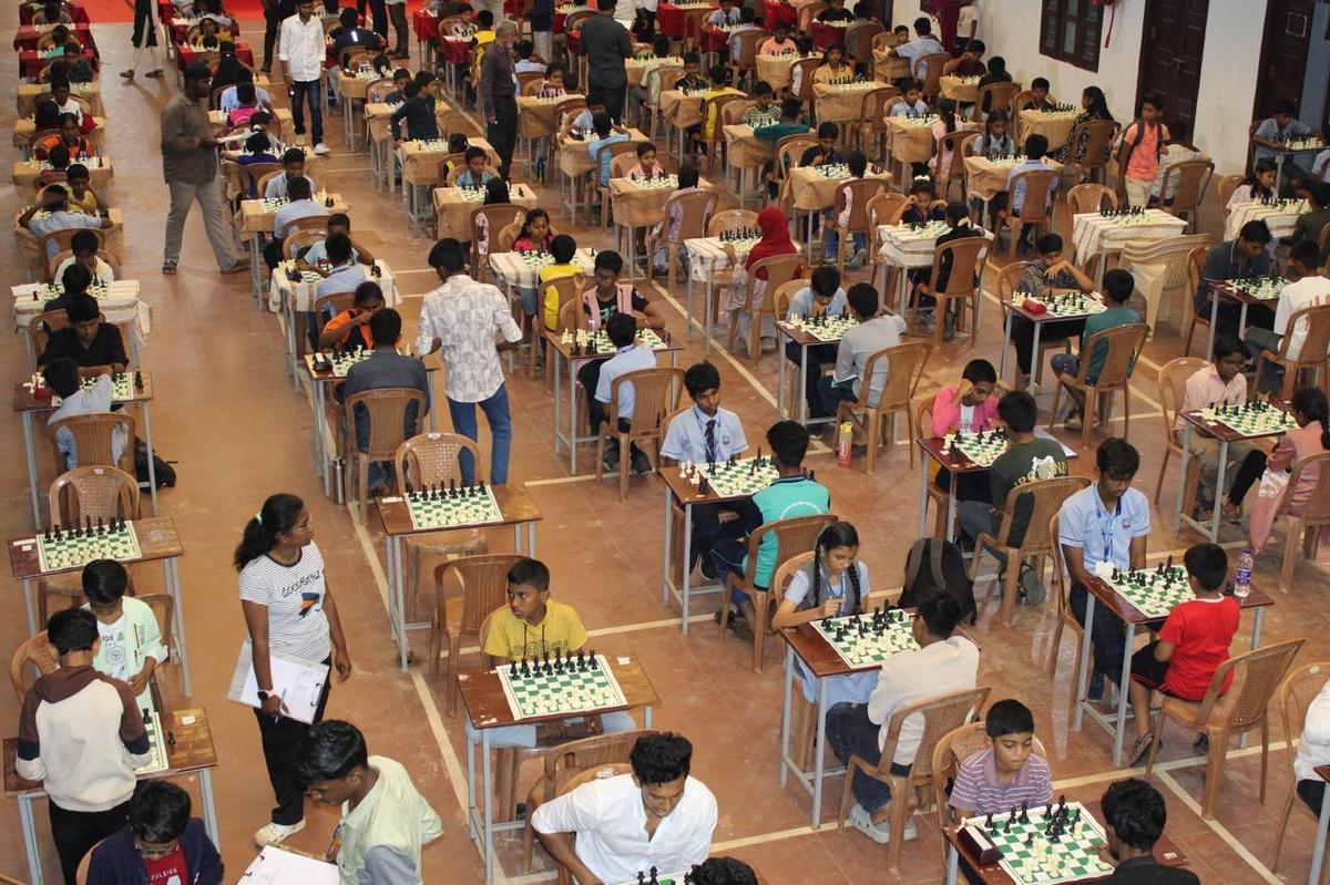 Students participating in the Young Minds Chess Tournament-2025 held at PET Engineering College in Valliyoor.