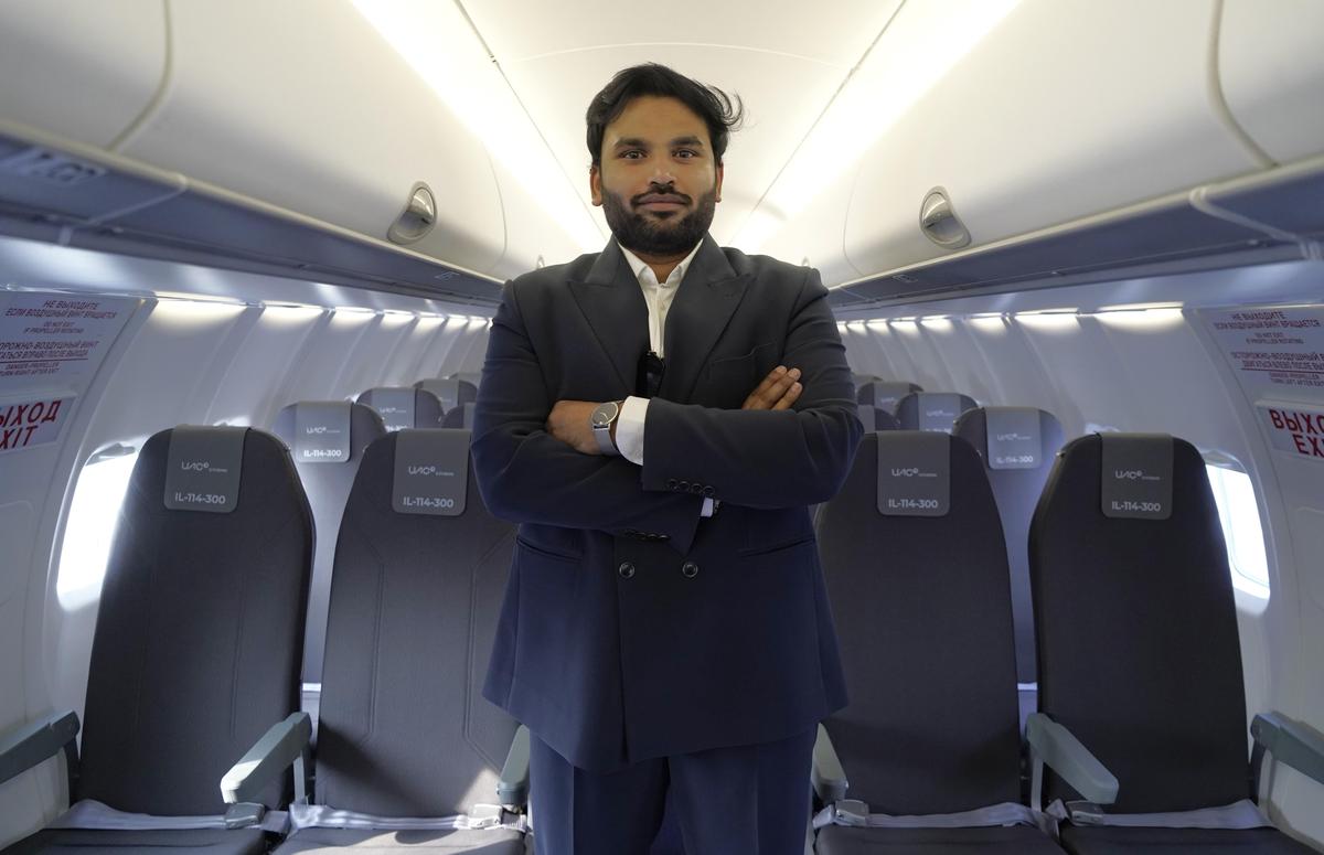 Founder & CEO of Flamingo Aerospace Subhakar Pappula on board Russian United Aircraft Corporation's (UAC) Ilyushin IL-114-300 on static display at Wings India 2026 at Begumpet Airport in Hyderabad on Thursday.