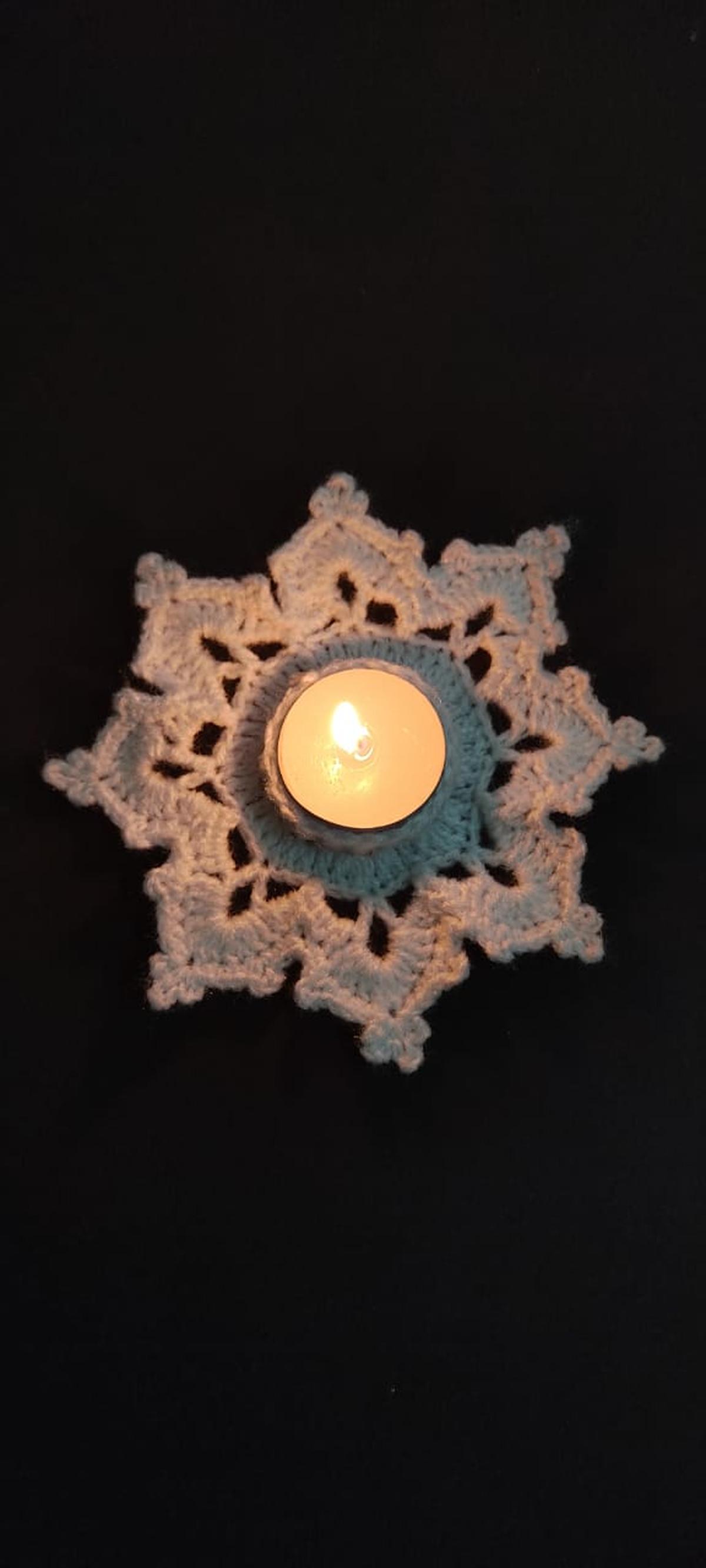 Crochet diya holders made by  Vineetha Nair. 