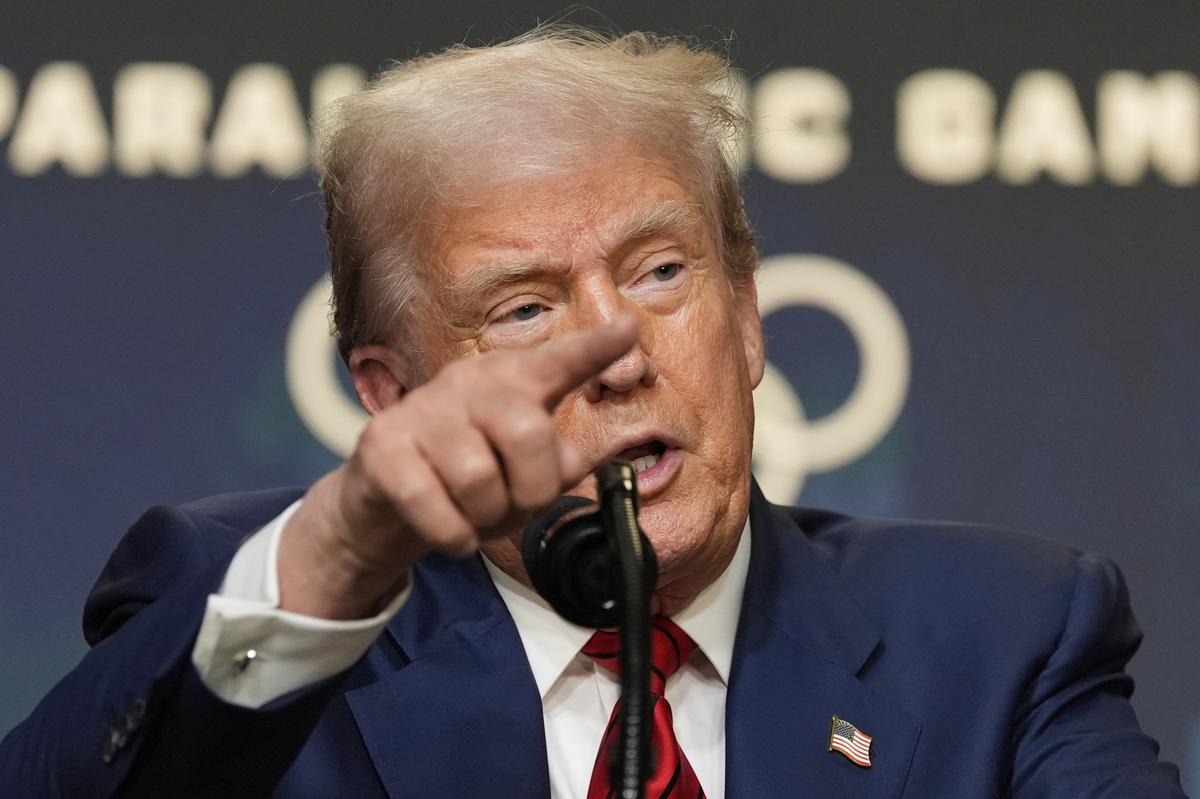 U.S. President Donald Trump answers questions from reporters on August 5, 2025, in Washington.