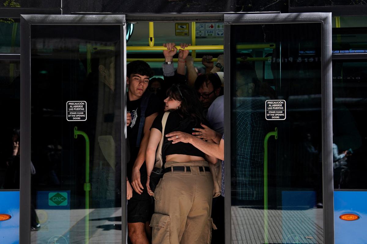 People ride a crowded bus, after the metro was closed during a power outage, in Madrid, Spain on April 28, 2025.
