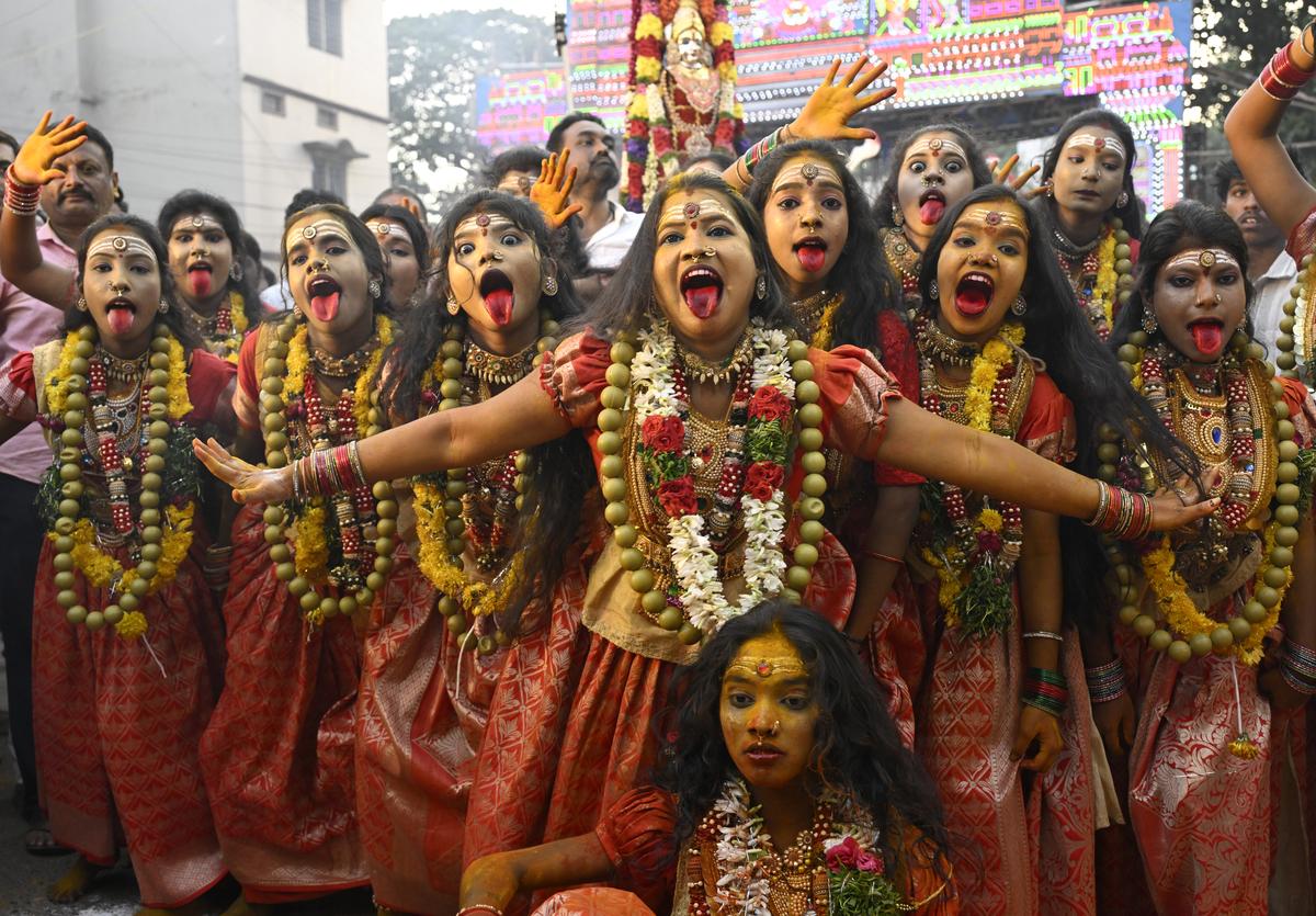 Artistes at a procession during the Bonalu celebration at Lal Darwaza in Hyderabad on Sunday. Artistes at a procession during the Bonalu celebration at Lal Darwaza in Hyderabad on Sunday.