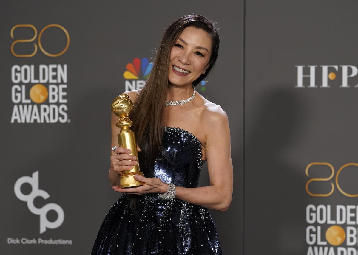 Michelle Yeoh poses in the press room with the award for best performance by an actress in a motion picture, musical or comedy for ‘Everything Everywhere All at Once’ at the 80th annual Golden Globe Awards 