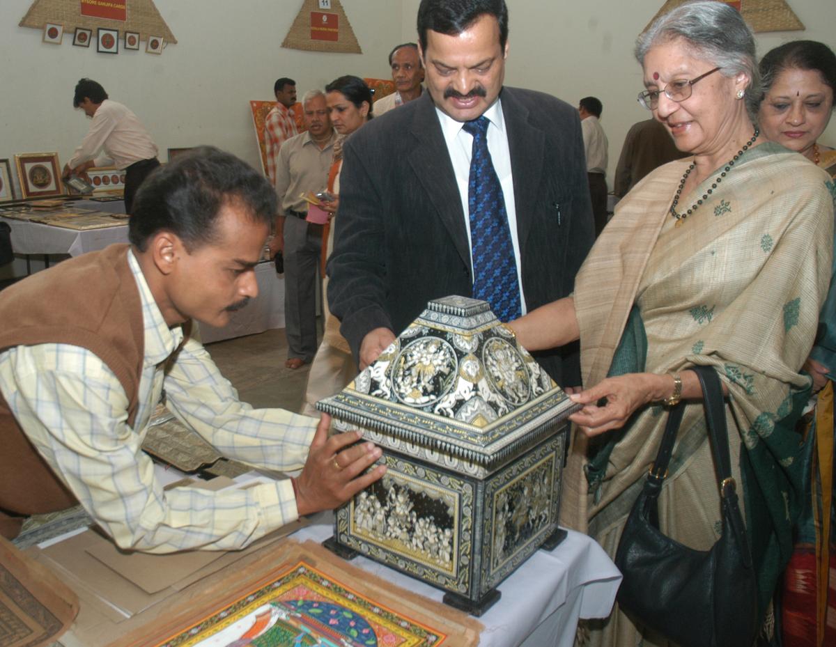 I.M. Vittala Murthy (second left), Secretary, Kannada and Culture, along with Vimala Rangachar (right), Chairperson of Craft Council, visiting a stall at ‘Kuteera-2008’, an exhibition and sale by Crafts Council of Karnataka, held at Chitrakala Parishat in Bengaluru on January 4, 2008.