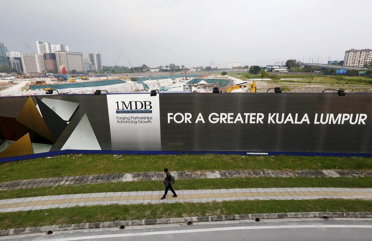 Indian origin banker issued prohibition order linked to 1MDB scandal of former Malaysian PM Najib Razak