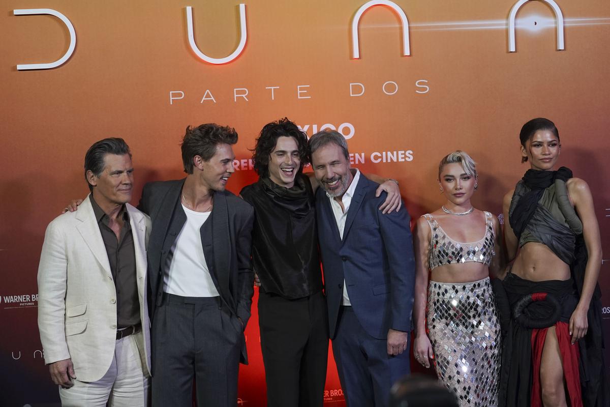 From left to right, Josh Brolin, Austin Butler, Timothee Chalamet, Denis Villeneuve, Florence Pugh and Zendaya pose for the photographers during the photo call promoting the film ‘Dune: Part Two’