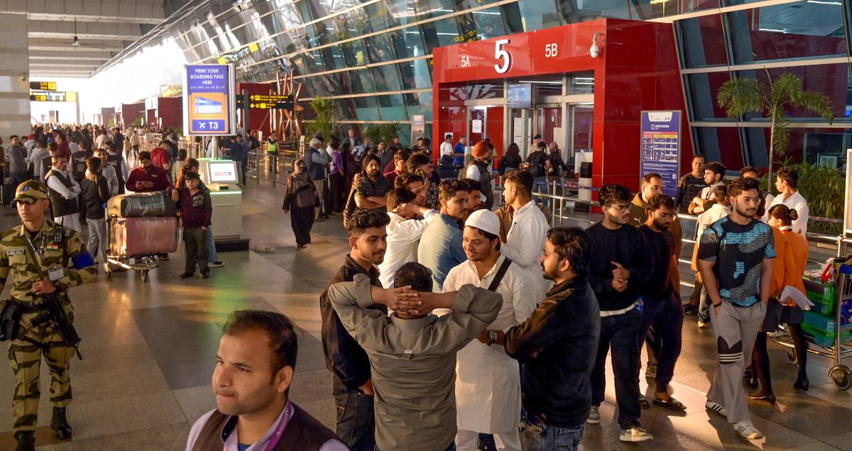 Passengers at the New Delhi international airport after several flights were cancelled due to the conflict on March 2, 2026.