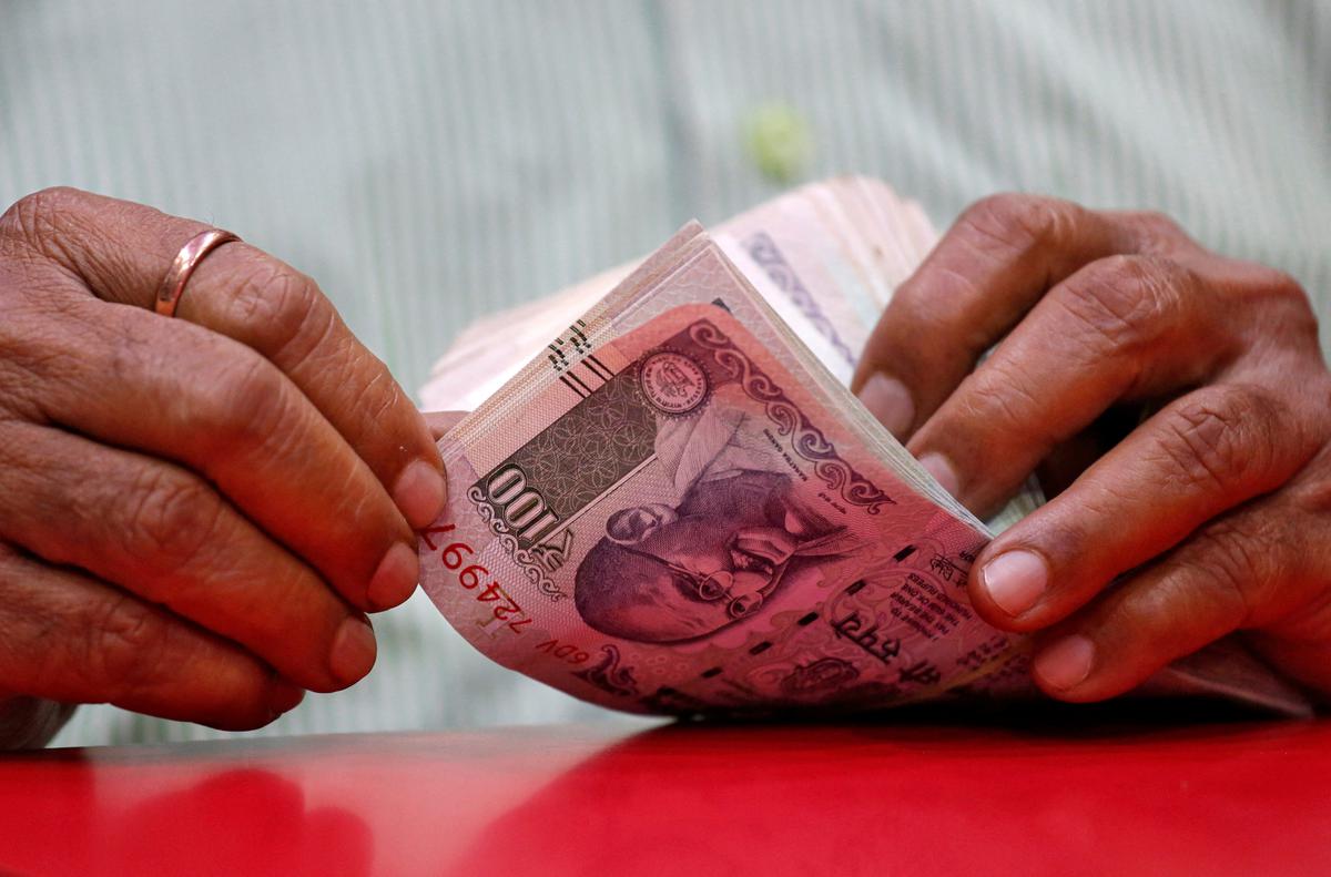 Rupee falls 5 paise to close at ₹82.38 against U.S. dollar