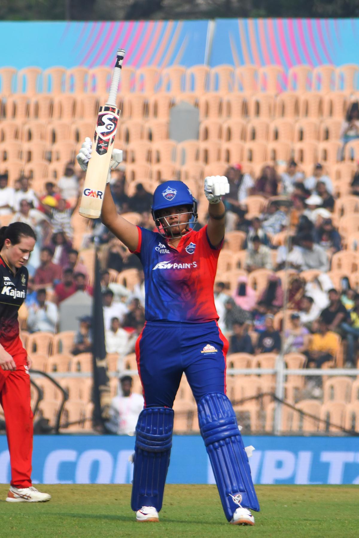 Shafali Verma celebrates scoring her half century during the WPL match between Delhi Capitals and Royal Challengers Bangalore at Brabourne Stadium in Mumbai on Sunday, March 5, 2023.