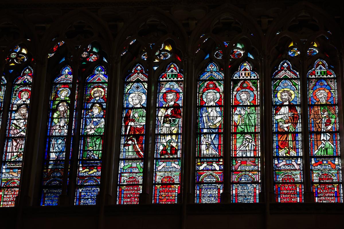 Stained glass windows are seen inside Notre-Dame de Paris cathedral while French President Emmanuel Macron visits the restored interiors of the monument
