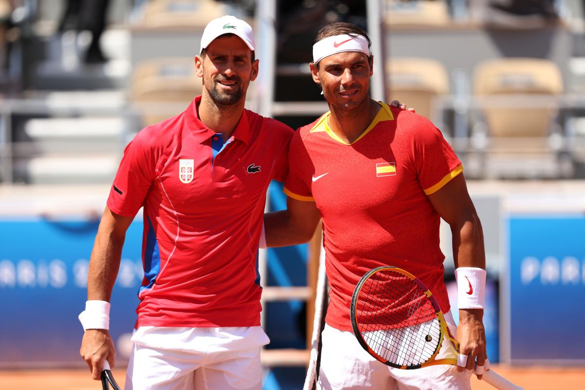 Tennis greats Novak Djokovic (left) and Rafael Nadal before their match at the 2024 Paris Olympics.