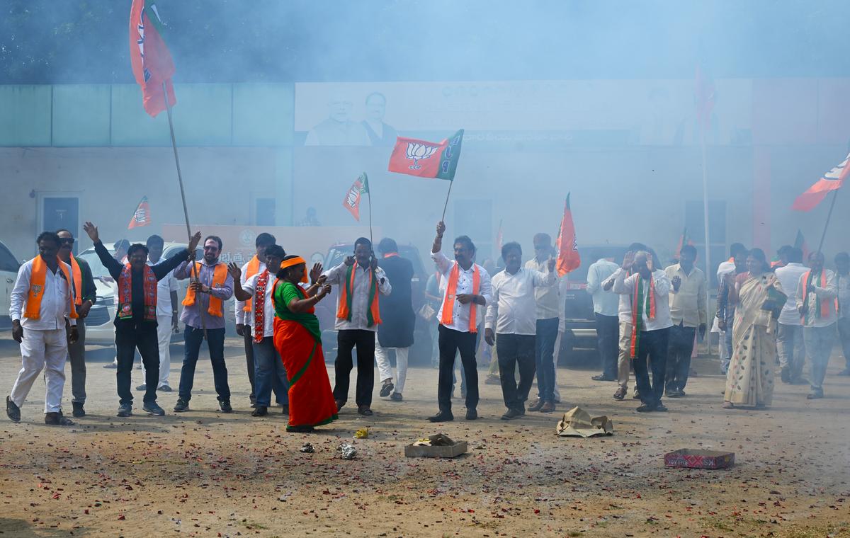 BJP leaders and activists celebrating the party’s win in Delhi Assembly elections, at the BJP office in Visakhapatnam on Saturday. 