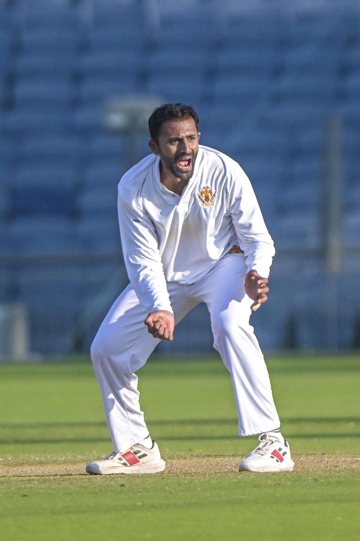 Karnataka’s Shreyas Gopal plays a shot on the second day of the Ranji Trophy match against Maharashtra at the MCA Stadium in Pune on Sunday, November 9, 2025.