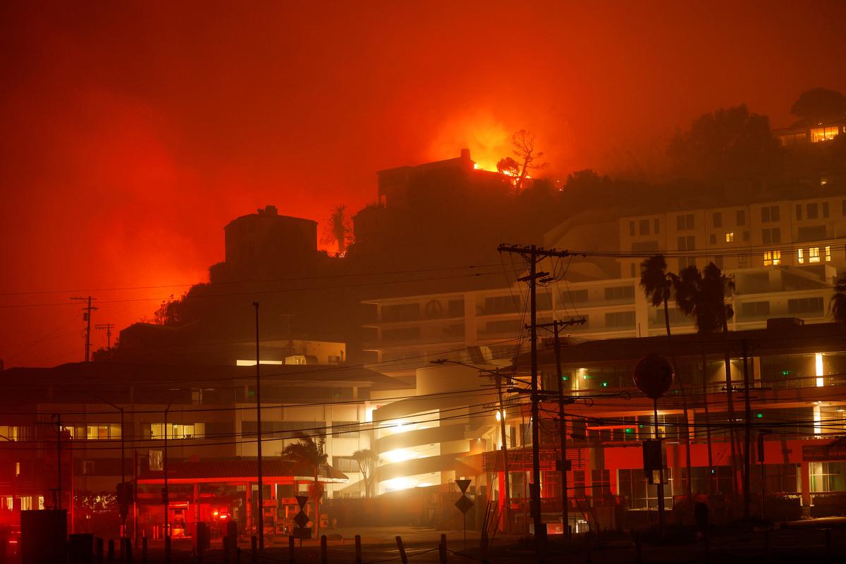 A building burns during the Palisades Fire in the Pacific Palisades neighborhood of west Los Angeles, California, U.S. on January 7, 2025. 