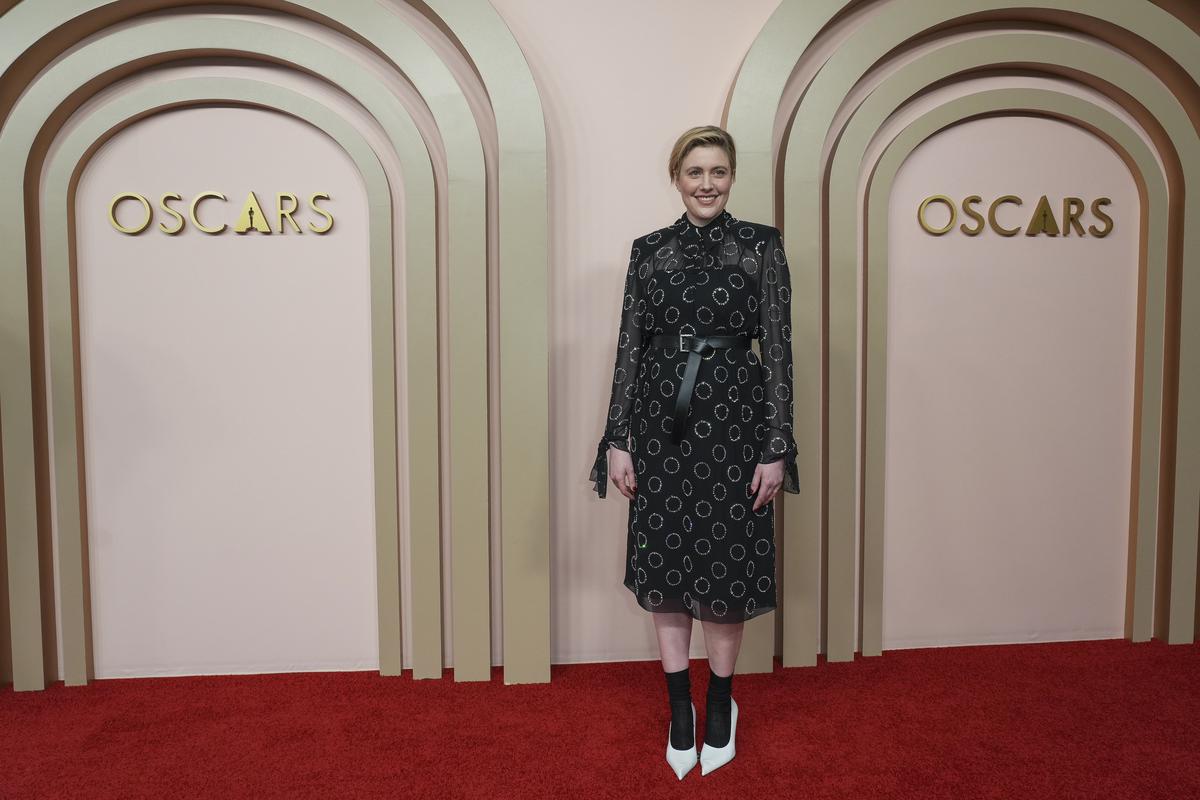 Greta Gerwig arrives at the 96th Academy Awards Oscar nominees luncheon