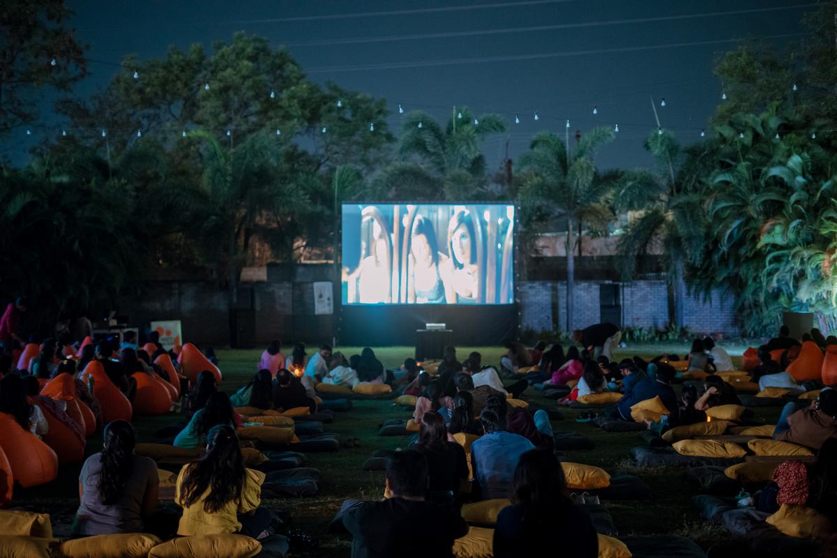 Watching movies in open-air theatre 