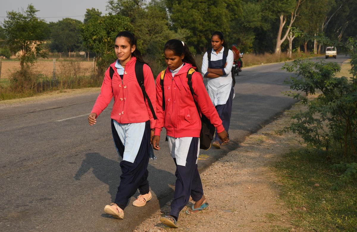 Students walking back home after school in Viratnagar.