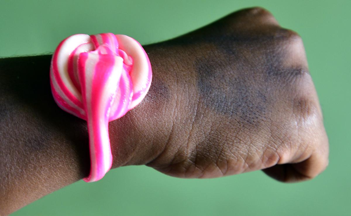 Thavalingam crafts his candy into various shapes. Here, he has made a watch 