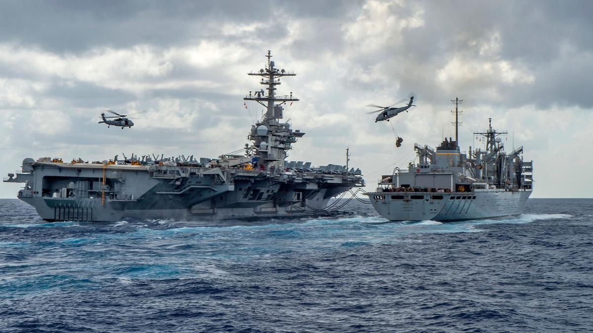 U.S. warplanes, ships and troops ready in the Middle East if the conflict expands