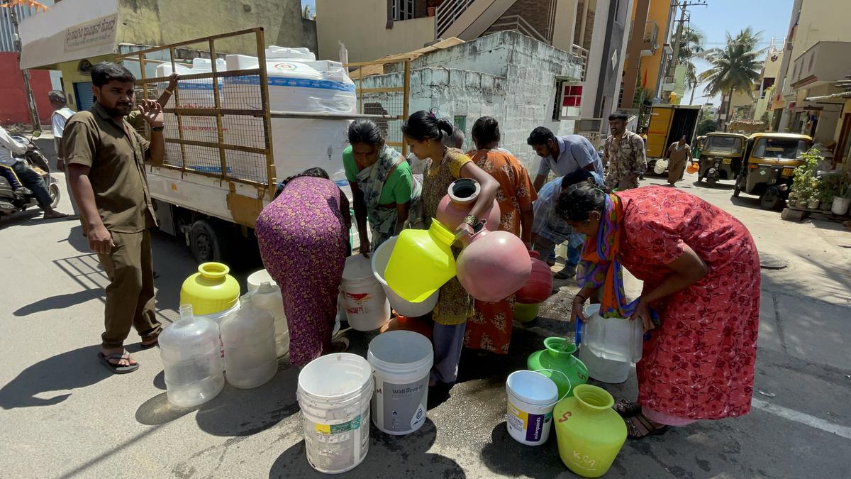 The residents of Bangarappanagar fetch drinking water supplied by BWSSB in the Rajarajeshwari Nagar zone, in Bengaluru. 