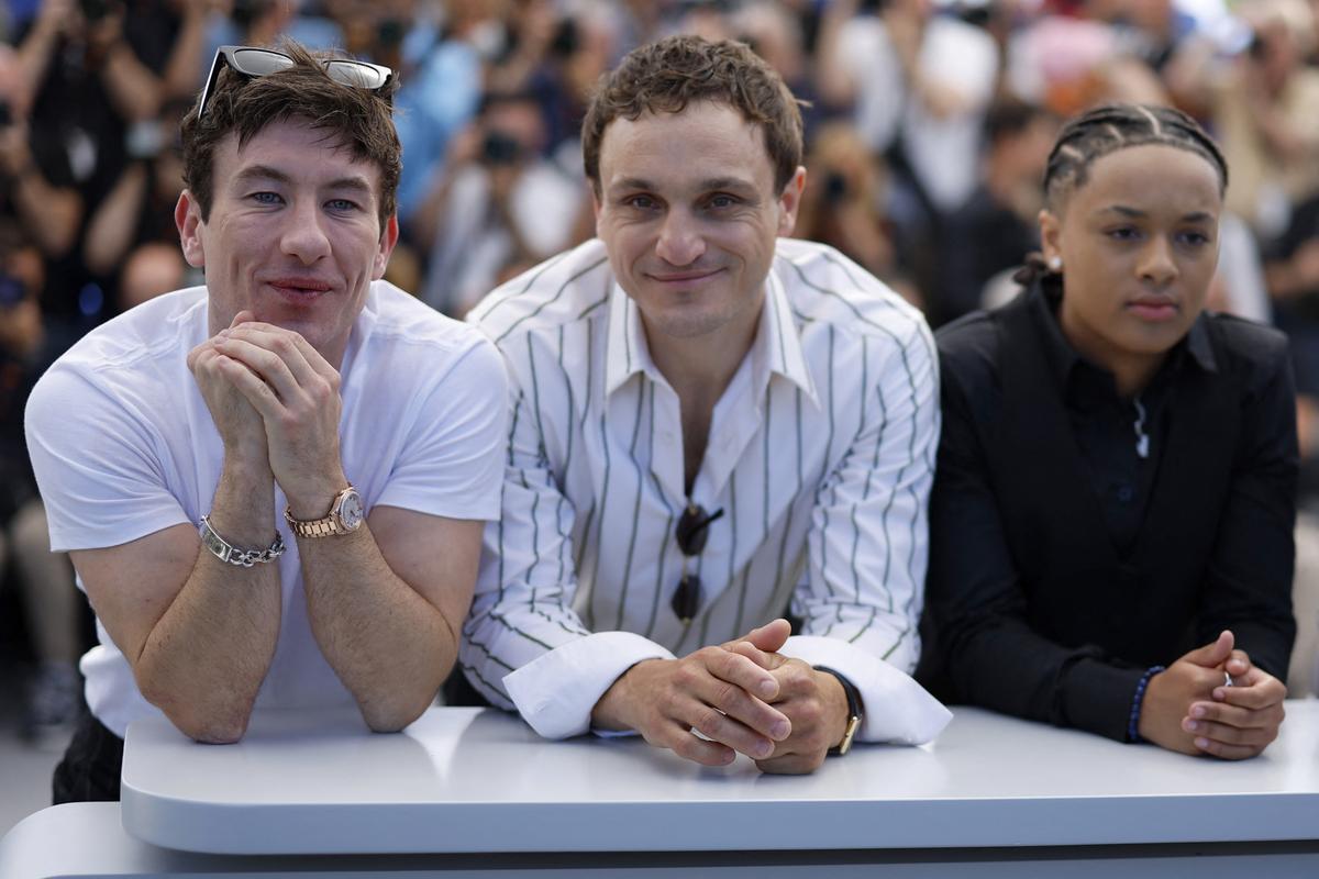 Cast members Barry Keoghan, Franz Rogowski, Nykiya Adams pose during a photocall for the film ‘Bird’ in competition at the 77th Cannes Film Festival in Cannes